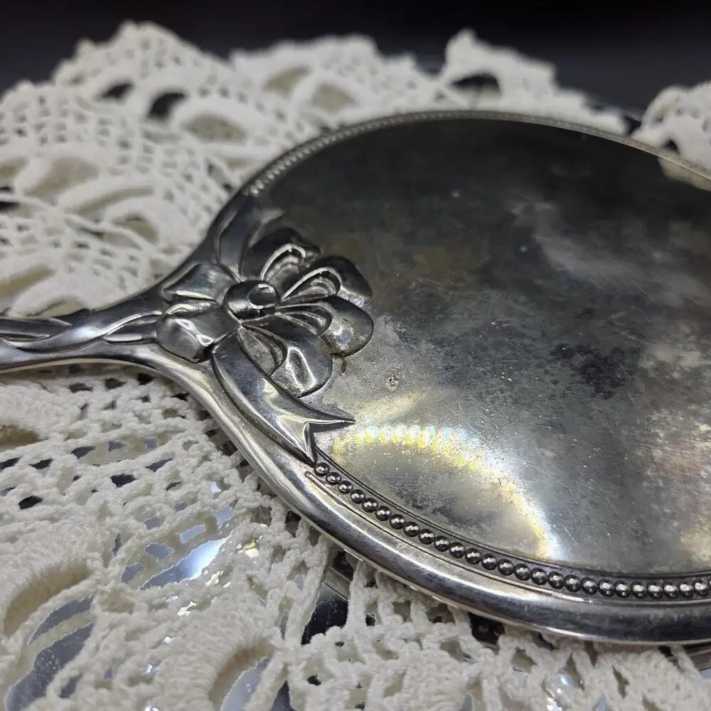 Heavy Vintage Antique Silver Plated Ornate Vanity Hand Mirror 8.75” x 5”